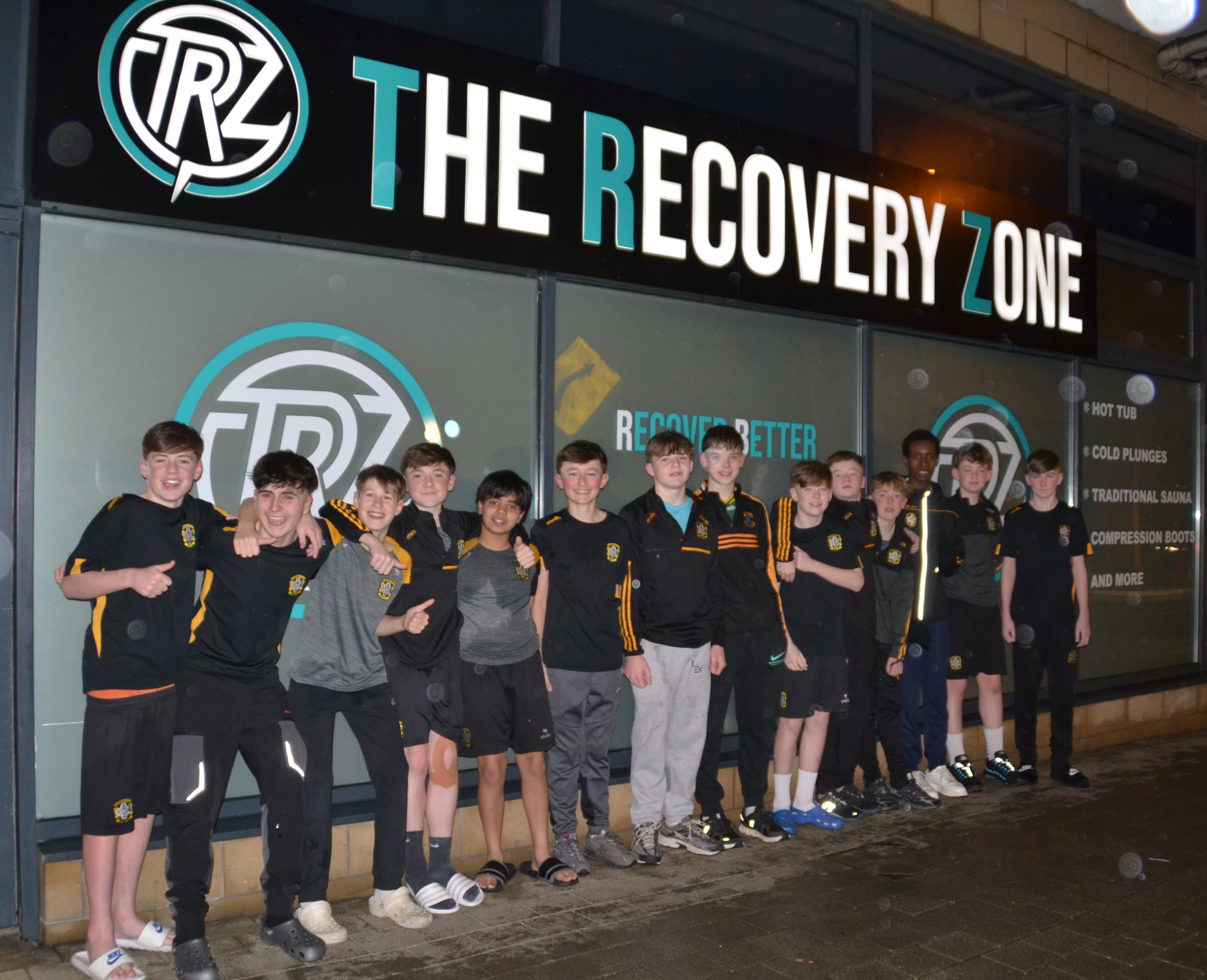 Sports team enjoying recovery session at The Recovery Zone